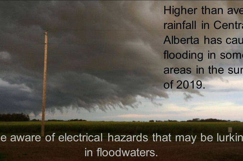 power pole in front of storm clouds