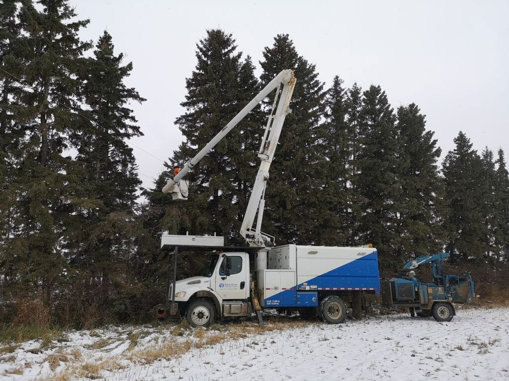 power line technician and lift truck