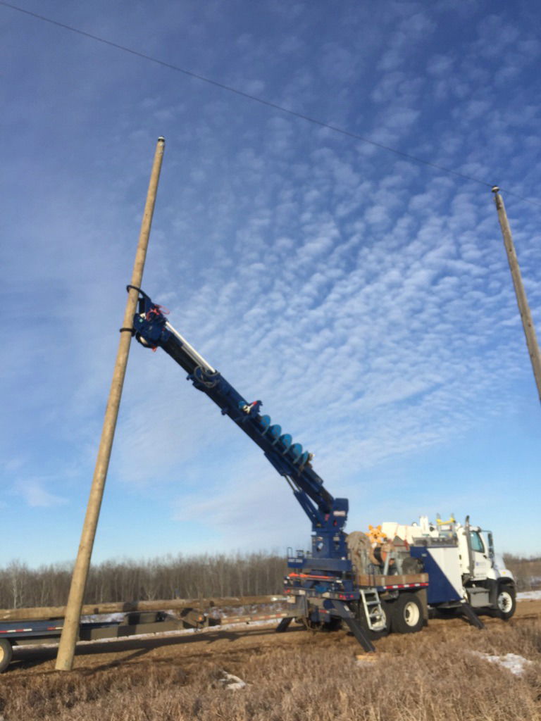 power line technician and lift truck